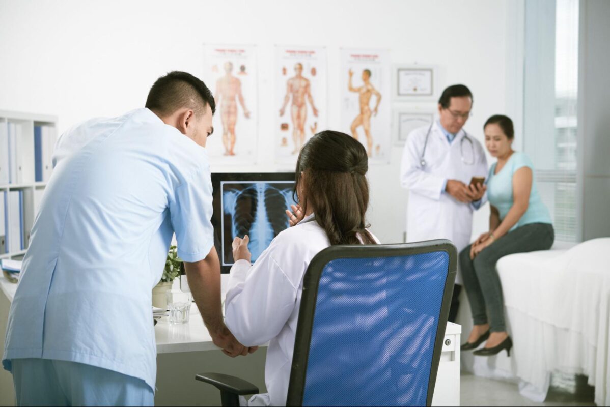 AI machine X-ray being shown to doctor